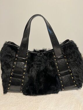 Kenneth Cole Black Rabbit Fur and leather bag with Studded Trim.